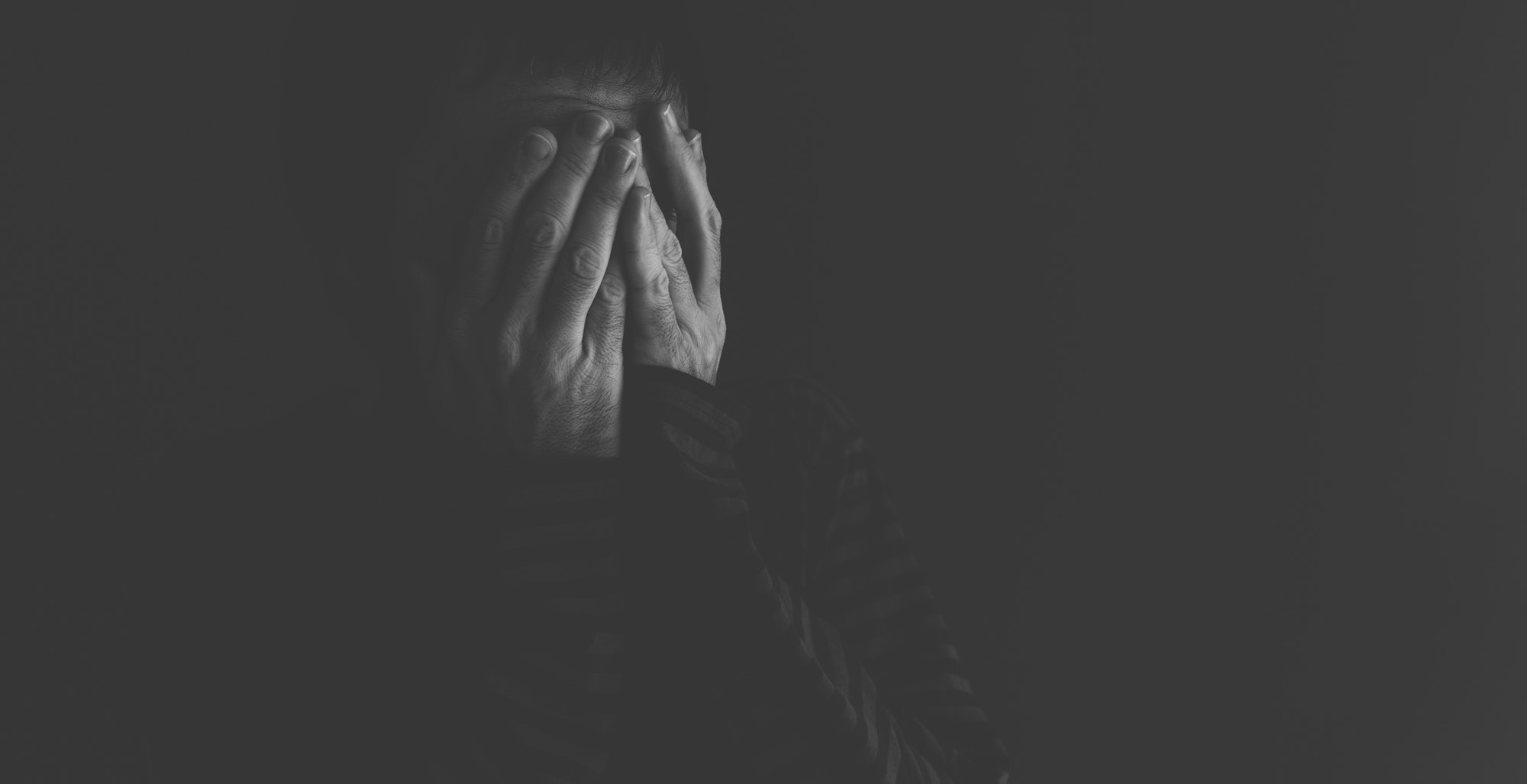 Extremely depressed, crying and distraught person