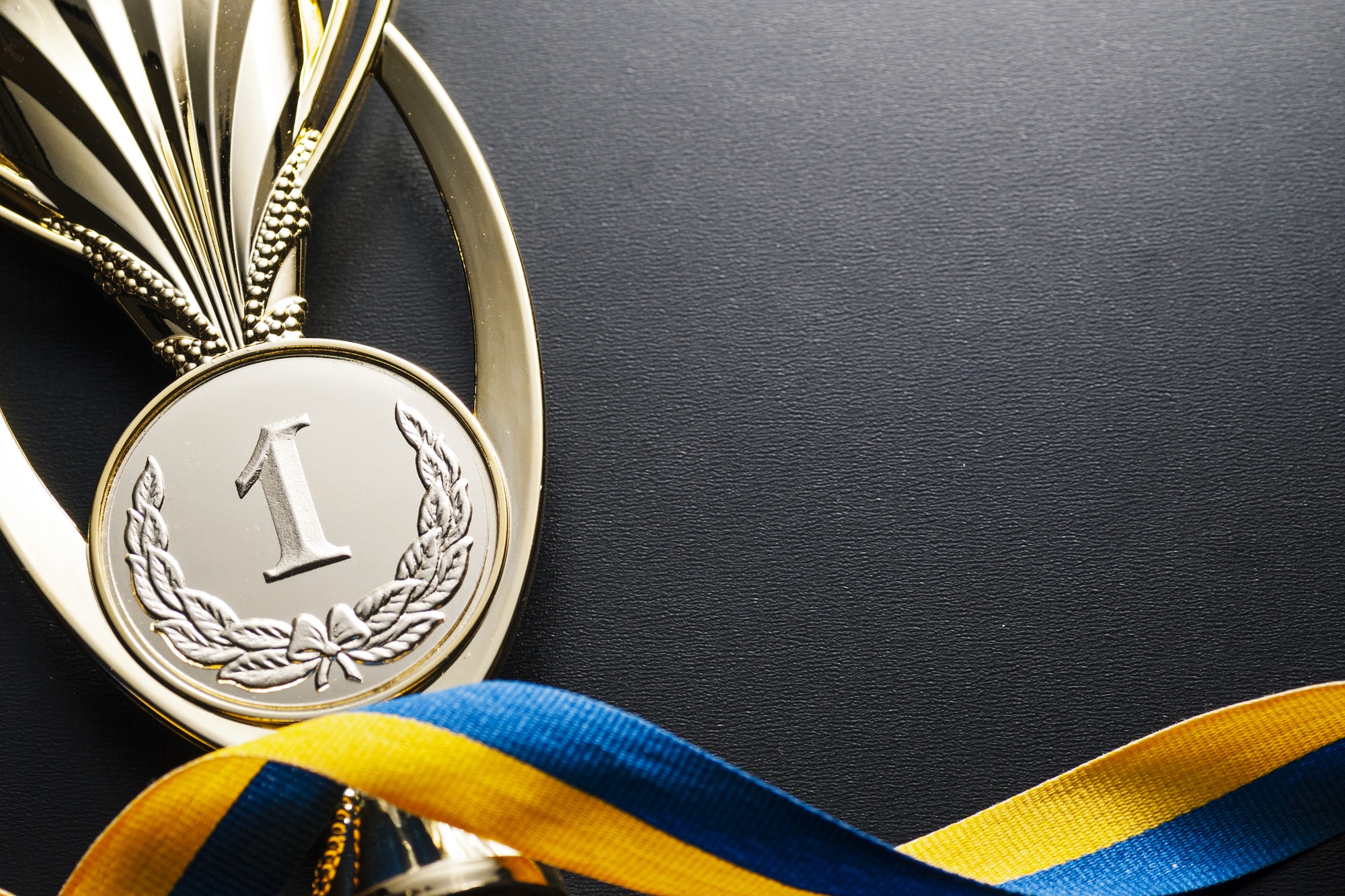Gold winners medal for a competition or race