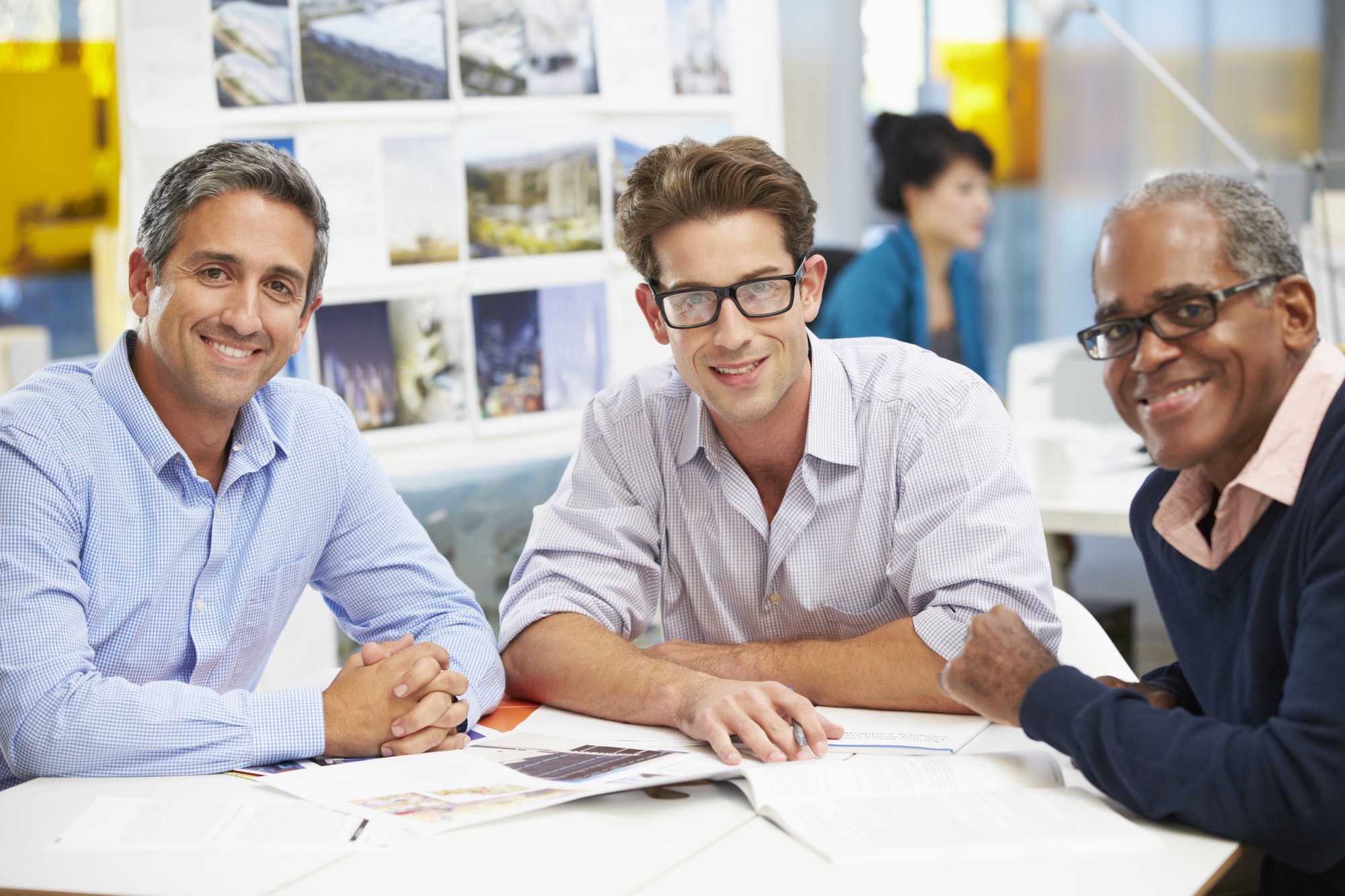 Group Of Men Meeting In Creative Office