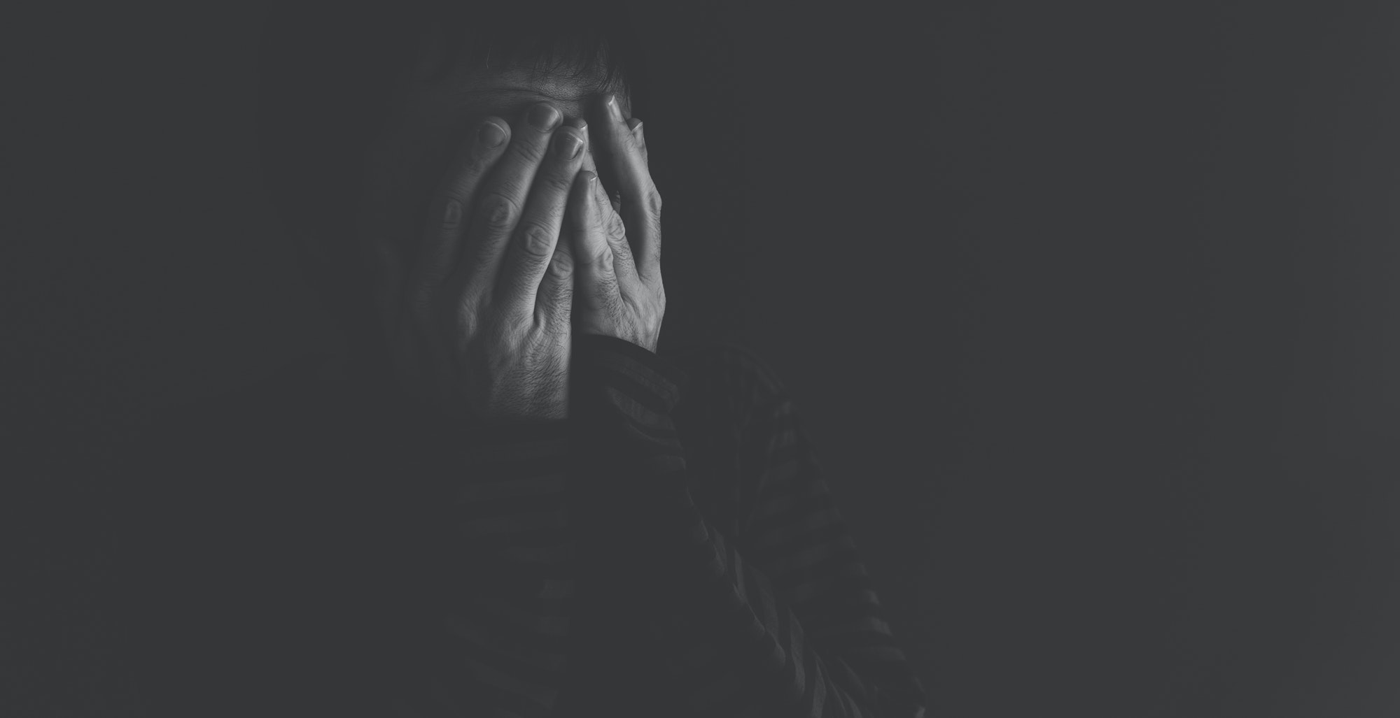 Extremely depressed, crying and distraught person