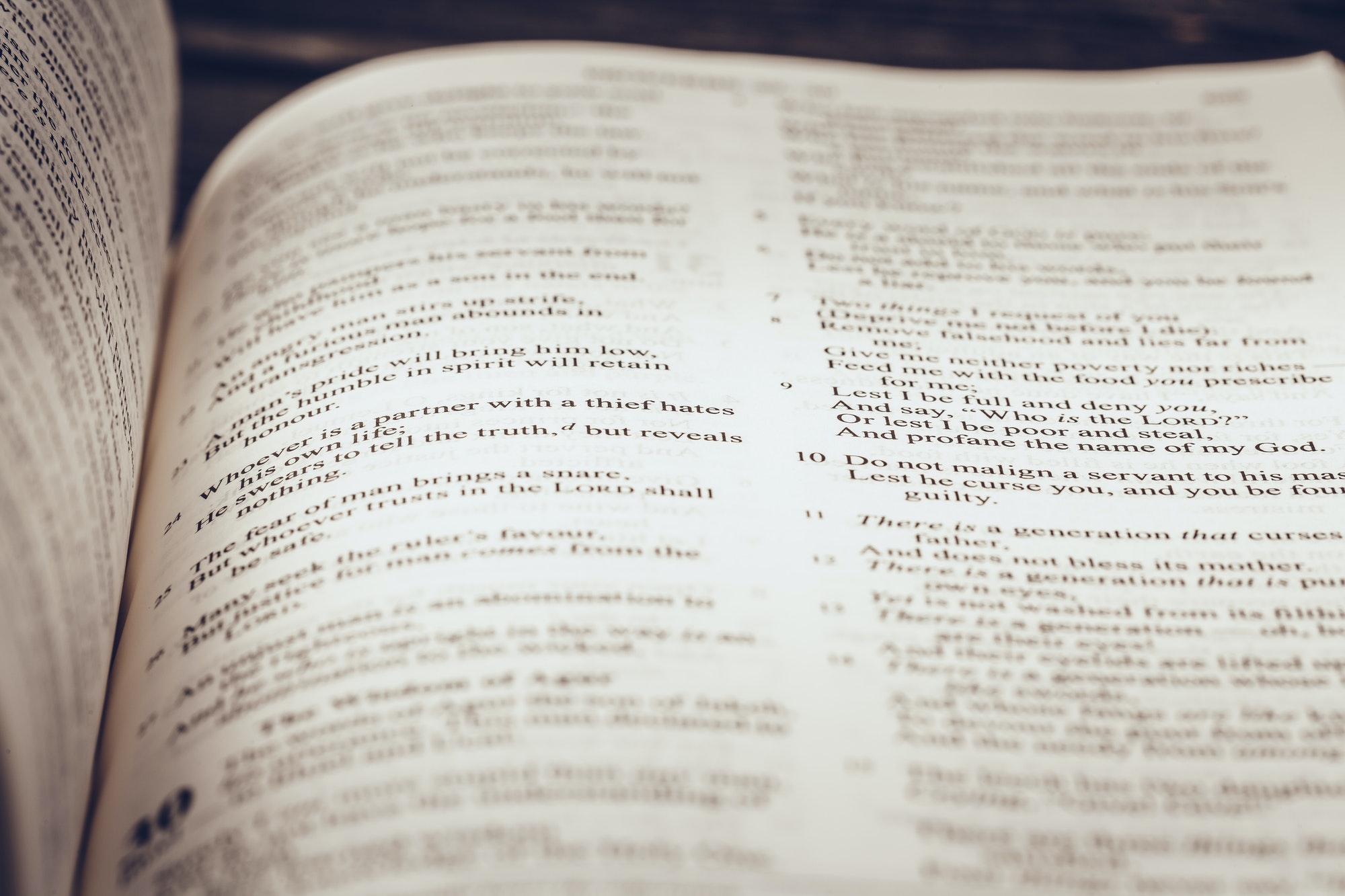 The Holy Bible on a wooden table
