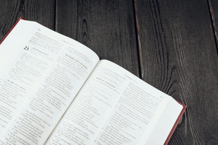 The Holy Bible on a wooden table