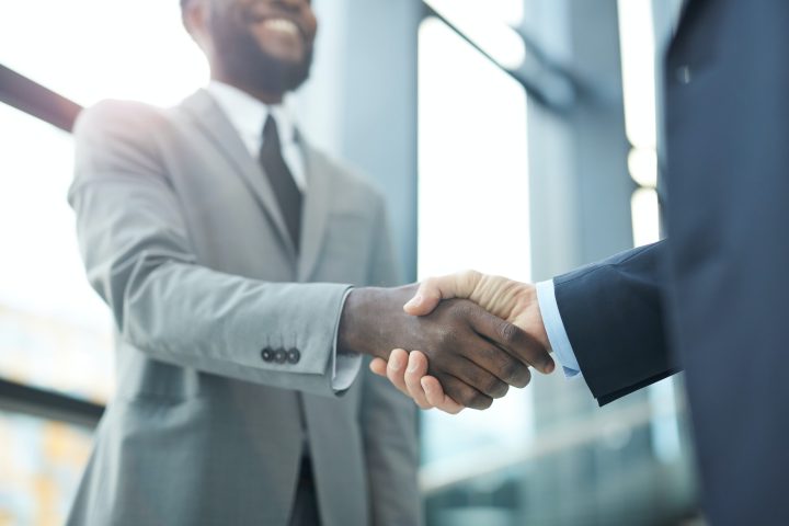 Unrecognizable Businessmen Shaking Hands
